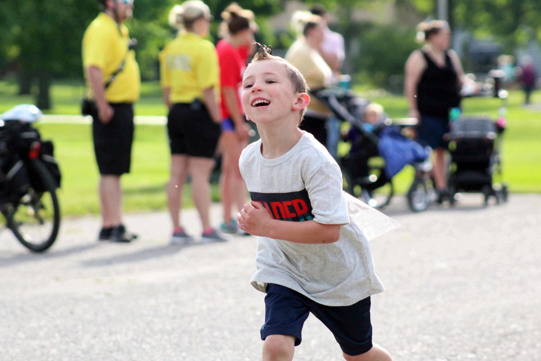Sam finishes half mile kids run